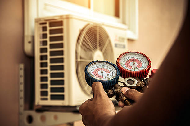 Professional Hvac technician working in Martinsville, VA